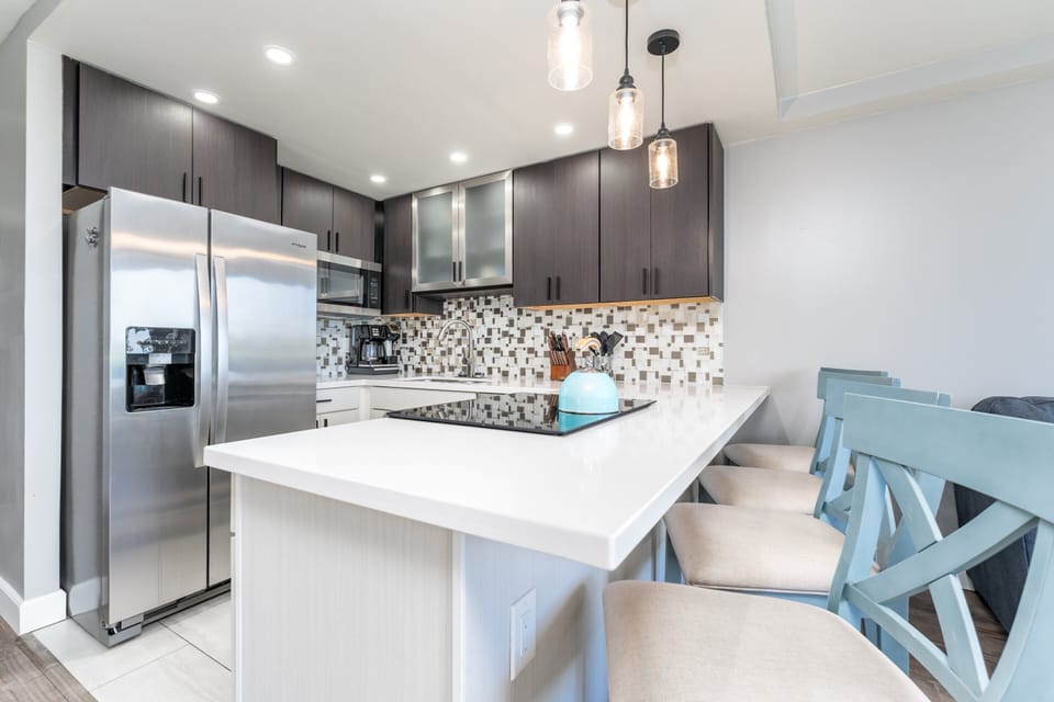 Fully renovated kitchen with fridge, stove/oven, dishwasher, coffee maker, toaster and many more