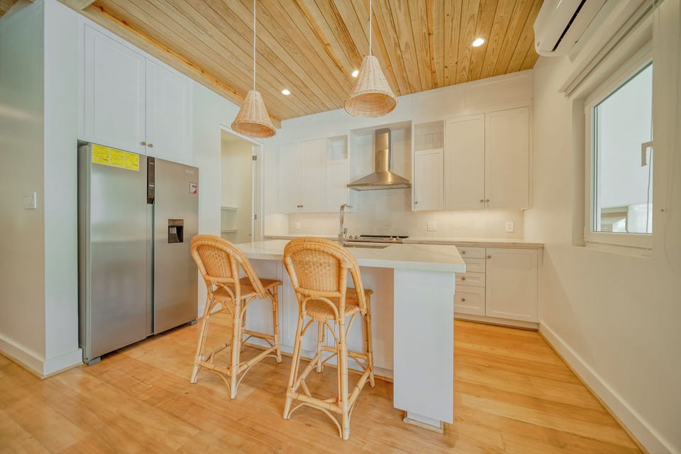 large kitchen with bar seating