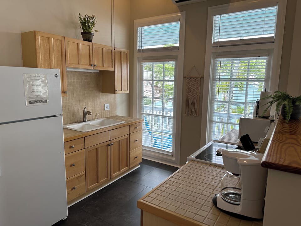 Superior 1 bedroom Apartment, 1 Queen Bed, City View, Annex Building, 2nd Floor Stair Access | Private kitchen | Microwave, coffee/tea maker, freezer, paper towels