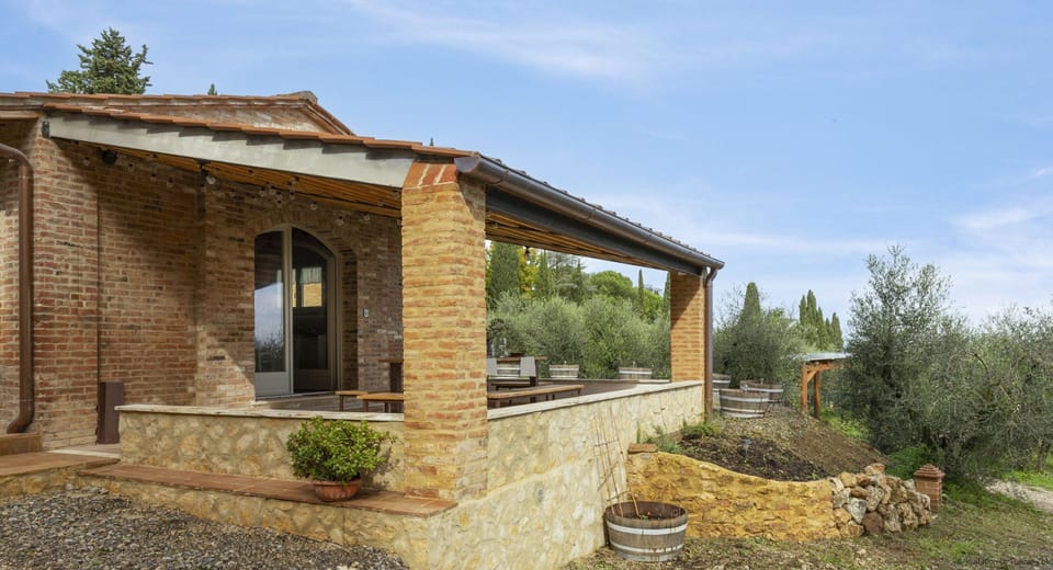 A shaded pergola at the front of the house is a perfect spot to hang out