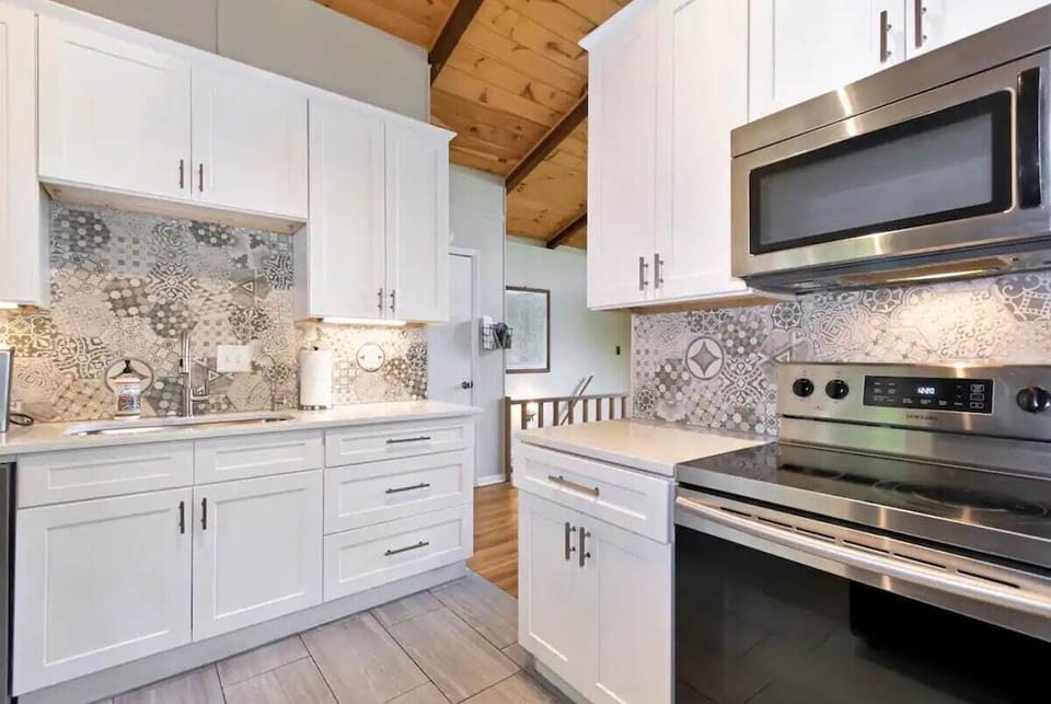 Gather around this warm, light-filled dining area — perfect for shared meals, morning coffee, or winding down with a glass of wine after a day in the mountains.