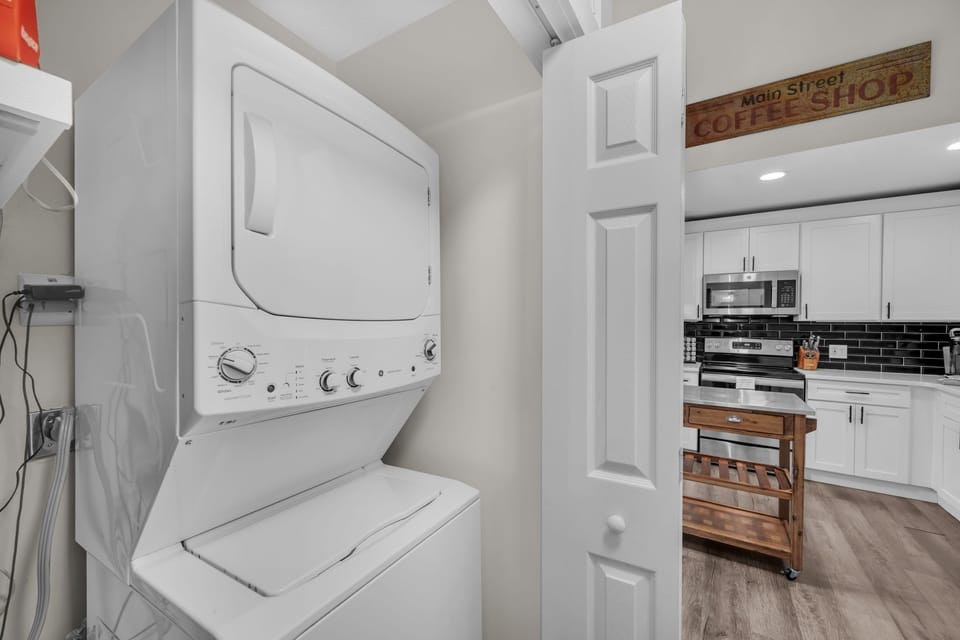 Convenient stacked washer and dryer for easy mid-stay laundry.