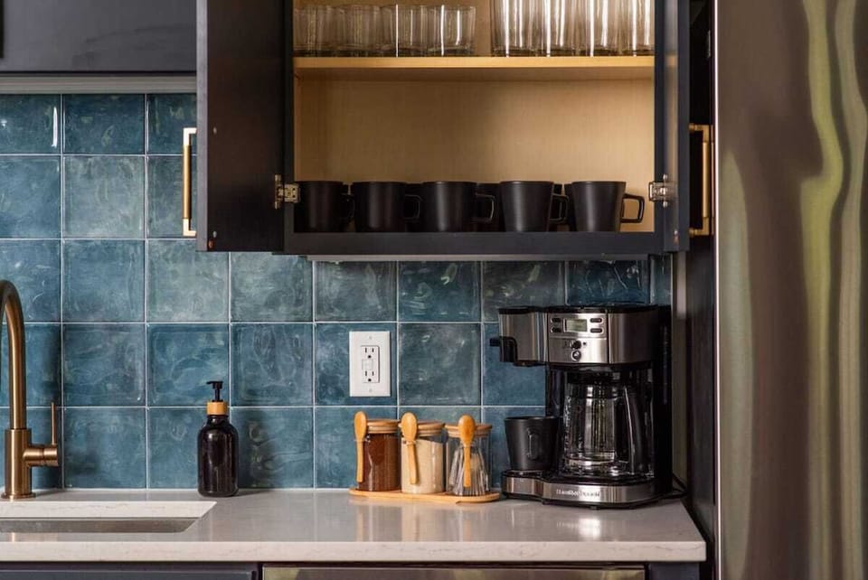 Brew your perfect cup of coffee at the cozy coffee corner, complete with a high-quality machine and an assortment of coffees, teas, and spices to start your day right.