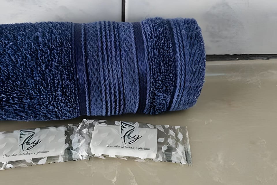 Shower, towels, soap, shampoo