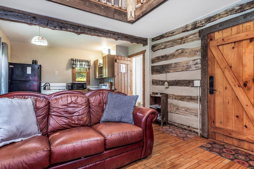  Cozy Living & Dining Areas: Lounge by the fireplace, enjoy TV, or stream via Wi-Fi