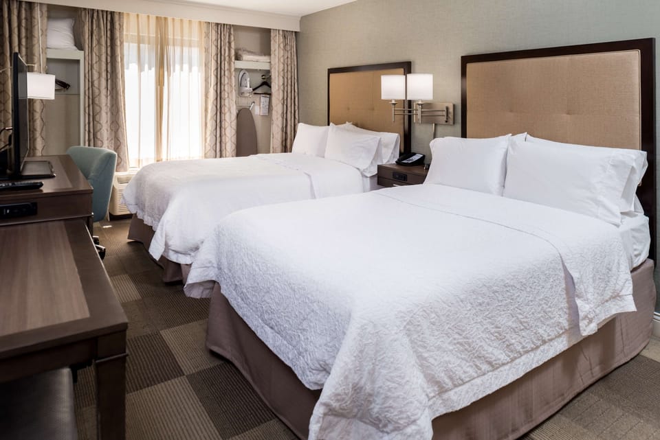Room, 2 Double Beds, Non Smoking | Premium bedding, in-room safe, blackout drapes, iron/ironing board