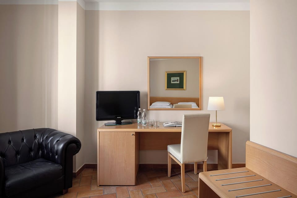 Premium bedding, down comforters, minibar, in-room safe