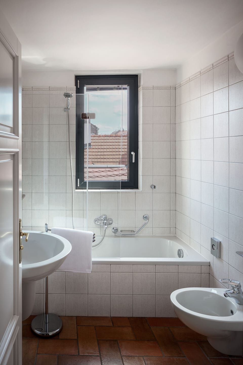 Designer toiletries, hair dryer, bidet, towels