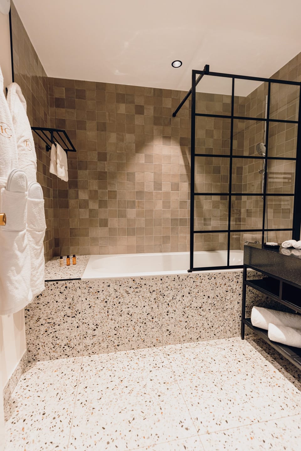 Deluxe Room | Bathroom | Designer toiletries, hair dryer, bathrobes, slippers