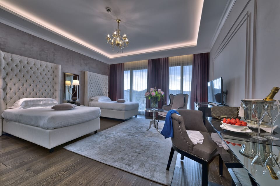 Premium bedding, down comforters, minibar, in-room safe