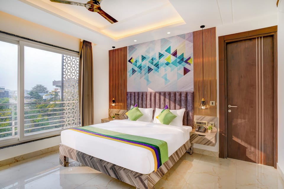 Deluxe Room | Individually furnished, desk, blackout drapes, iron/ironing board