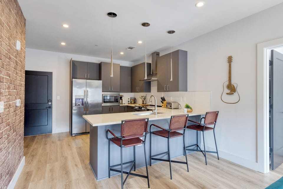 Sleek, fully equipped kitchen.