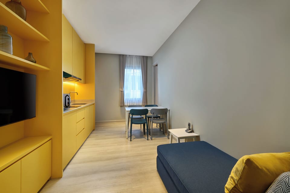 Vibe Suite 2 Bedrooms | Living area | 42-inch Smart TV with cable channels