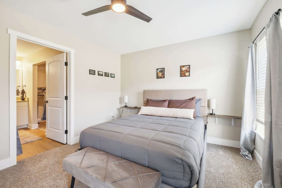 Master bedroom with a queen size bed. Got to love the connected bathroom and nice walk-in closet!