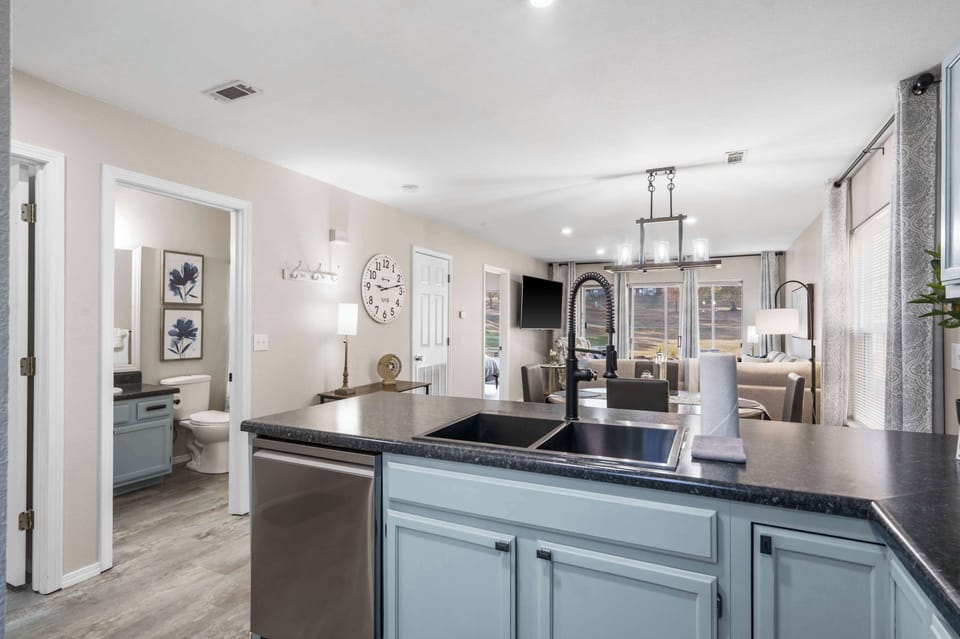 The open, airy kitchen offers ample space & all the comforts of home