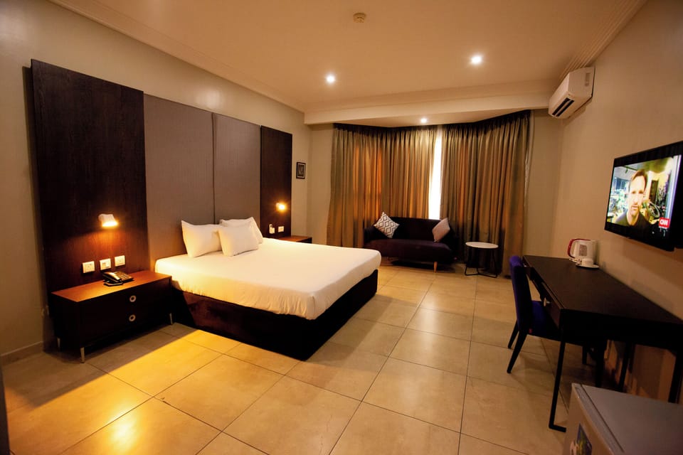 Executive Double Room, City View | In-room safe, desk, laptop workspace, blackout drapes