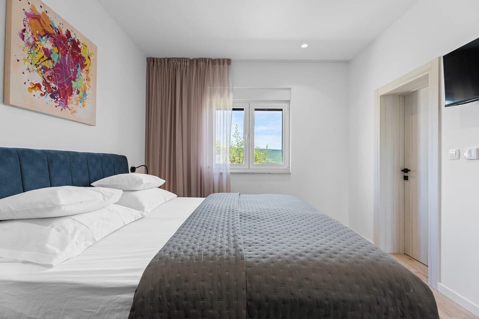 Bedroom No.3 is perfect for accommodating guests or family members,TV