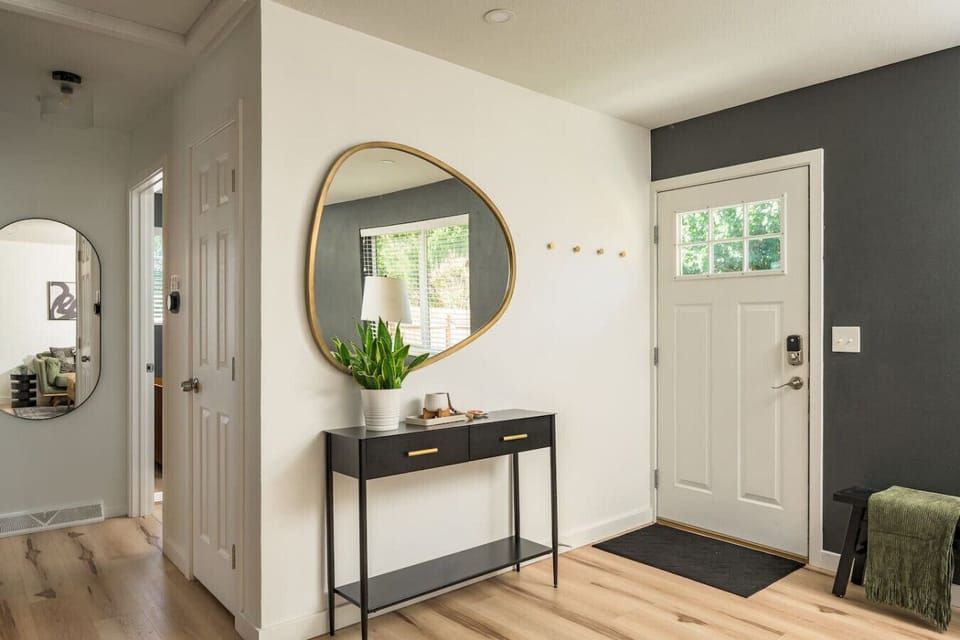 Entryway with coat hooks and modern charm.