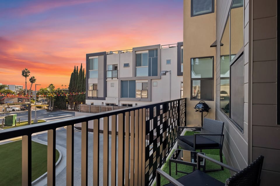 Enjoy people watching & views of the vibrant neighborhood from your balcony.