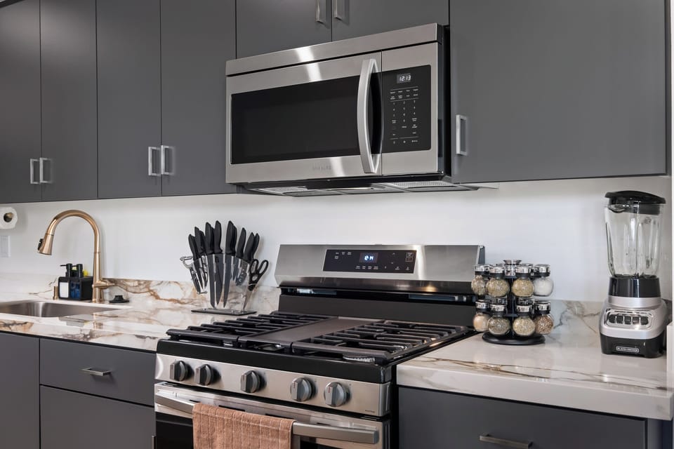 Cook like a pro with fully equipped kitchen appliances and cookware.