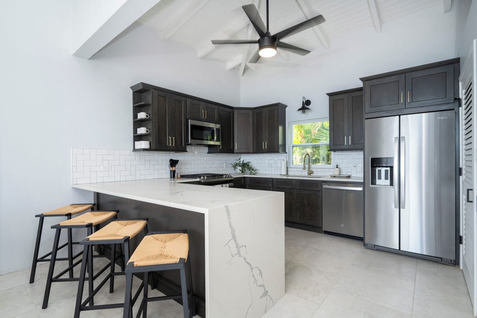 full kitchen featuring new appliances