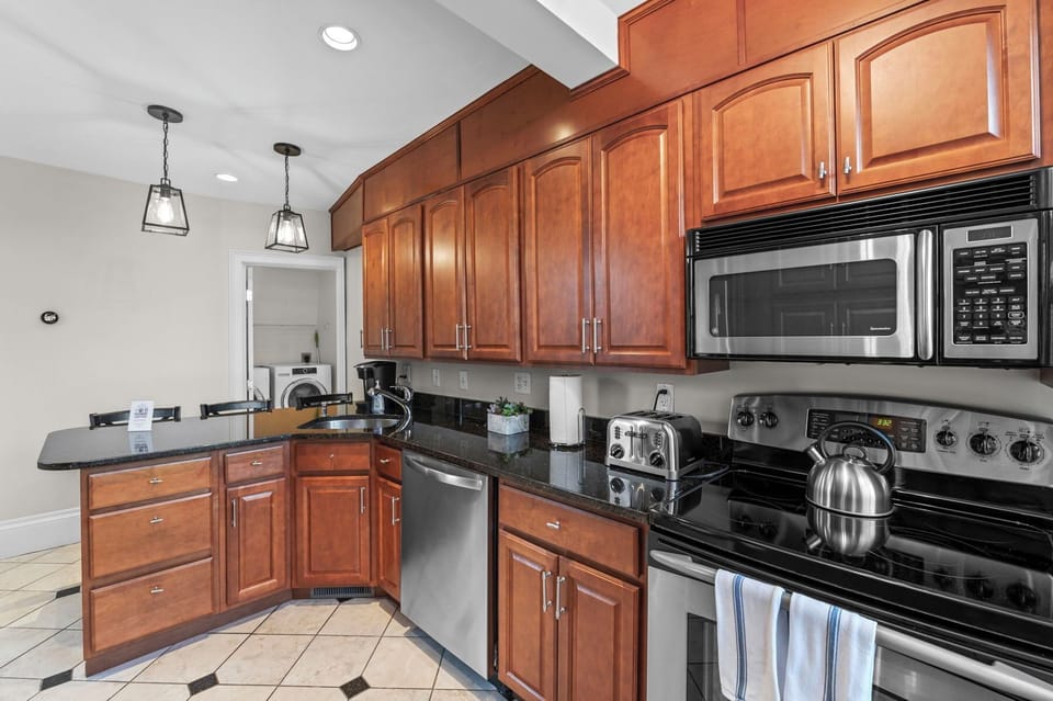 A full and stocked kitchen with all of your culinary needs
