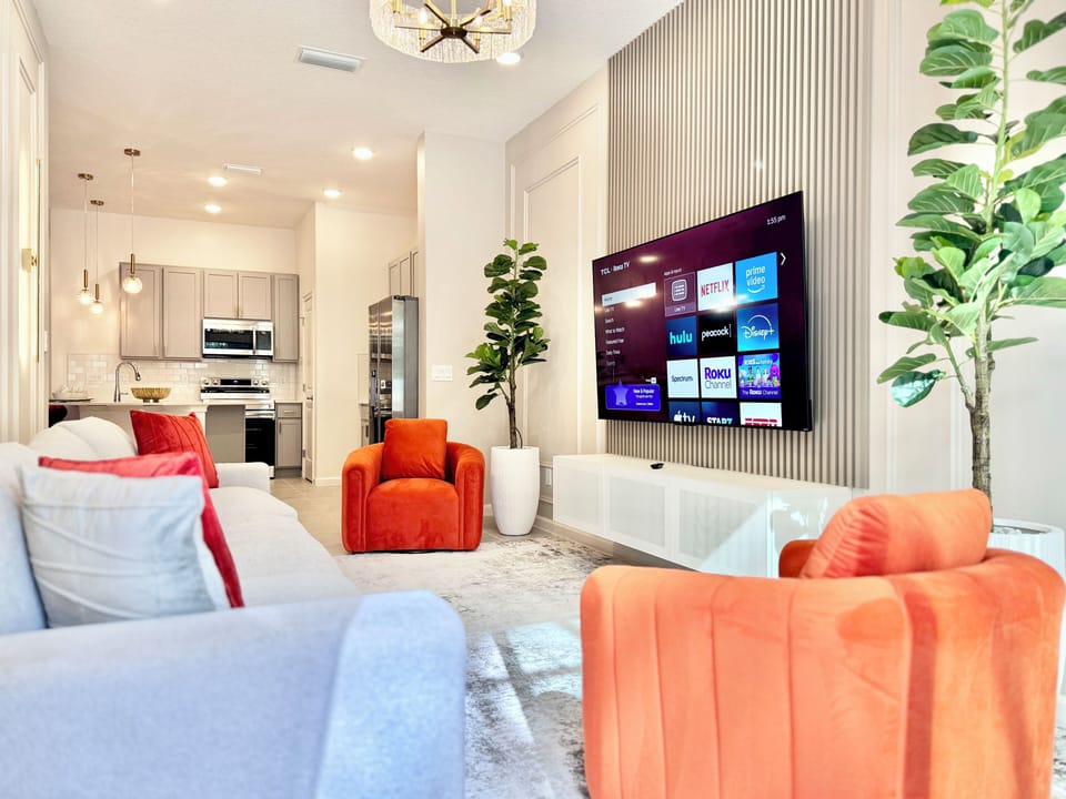 Elegant living room, relax with our 75" TCL Roku