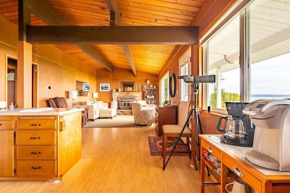 A coffee nook and a kitchen with breakfast provisions