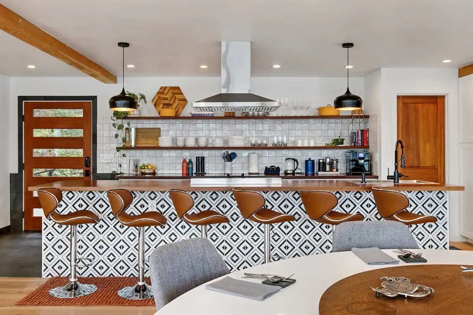 ...Fully equipped with wood countertops, high-grade appliances, and every utensil you could ever need.