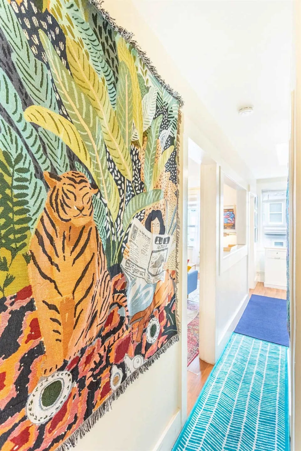 Bringing life and character to our hallway, the artwork on the walls tells a story of style and creativity
