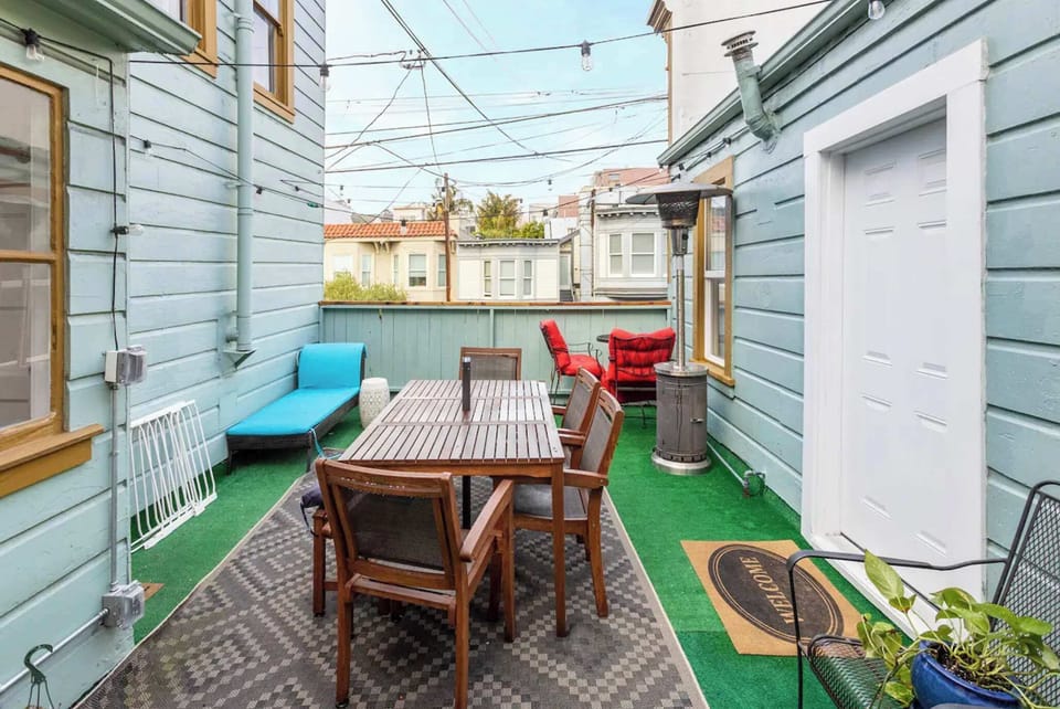Outdoor patio with Weber grill and gas heater