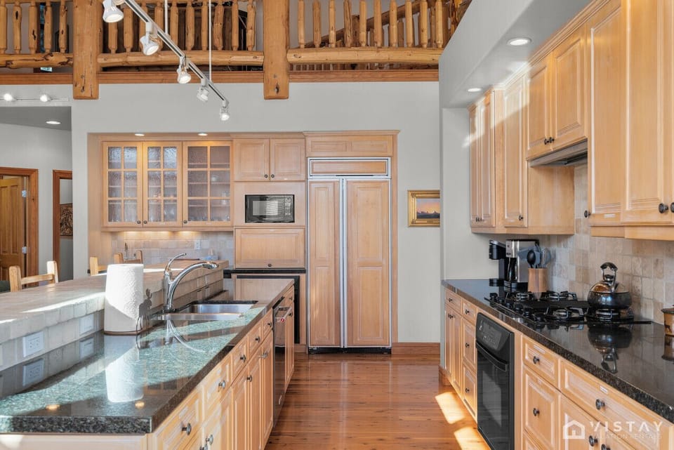 Fully-equipped modern kitchen with all appliances and tools, ready for cooking