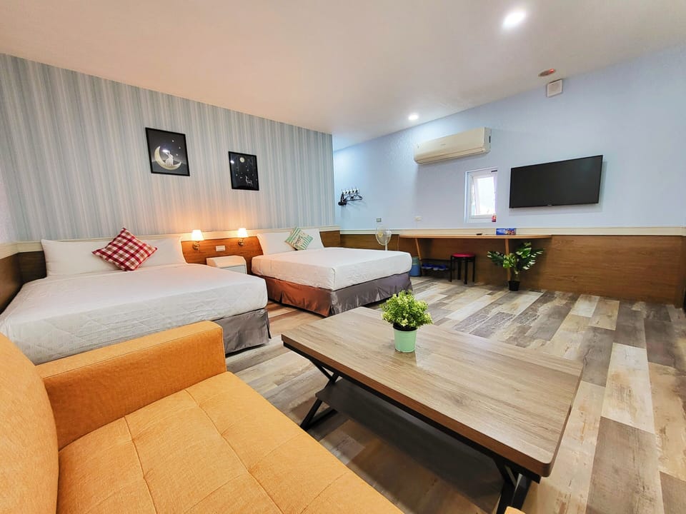 Comfort Quadruple Room, 2 Double Beds | Individually decorated, laptop workspace, blackout drapes, soundproofing