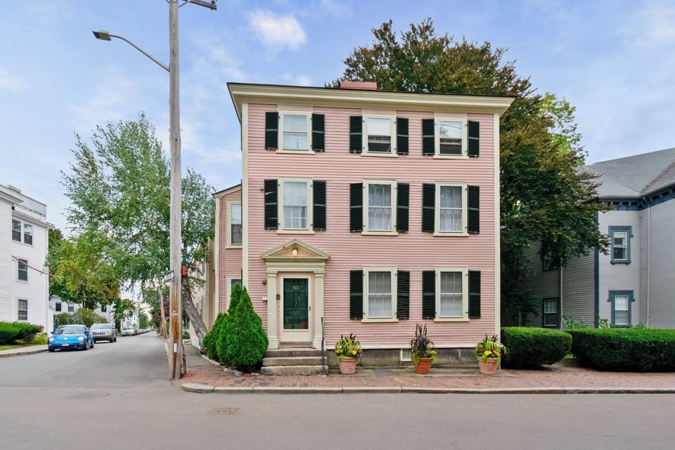 The apartment is situated on the second floor of this Pink house!