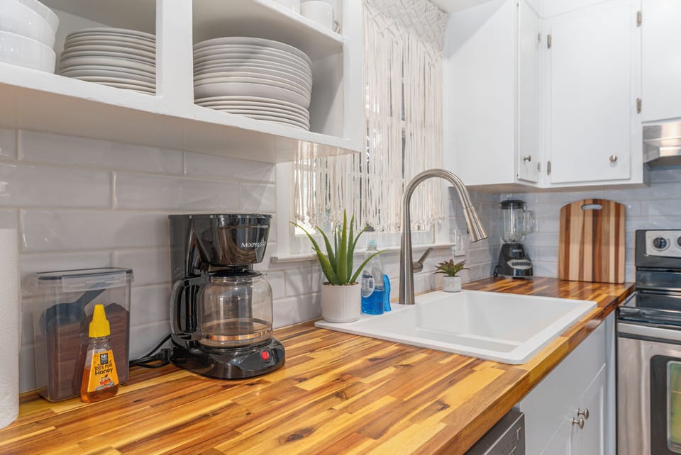 Coffee station and prep area with modern finishes