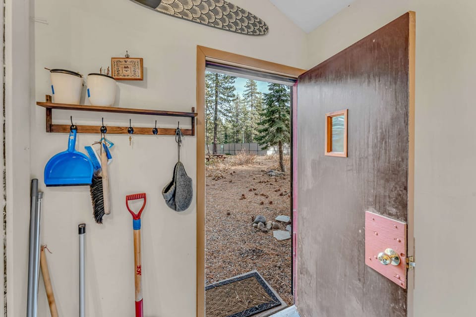 Mudroom: Full-size washer and dryer, access to backyard
