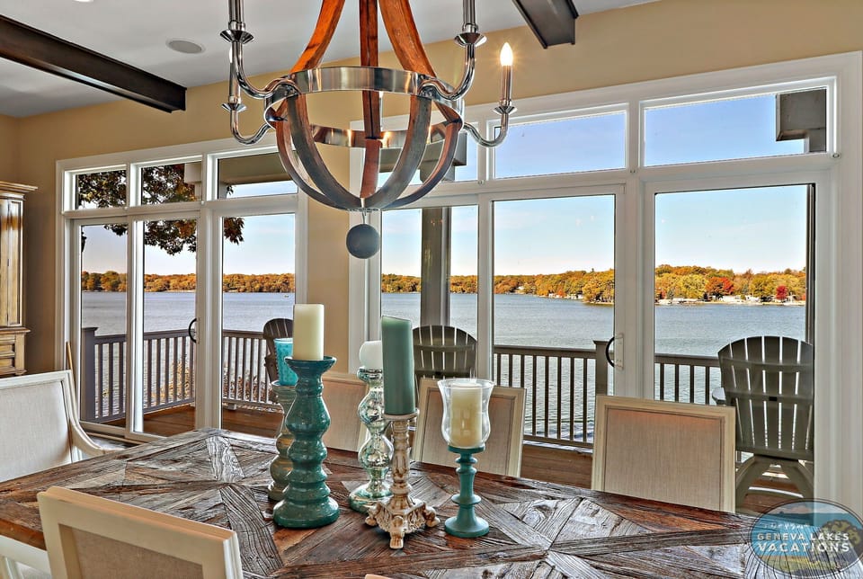 Dining room with seating for 8 guests. Patio door to balcony
