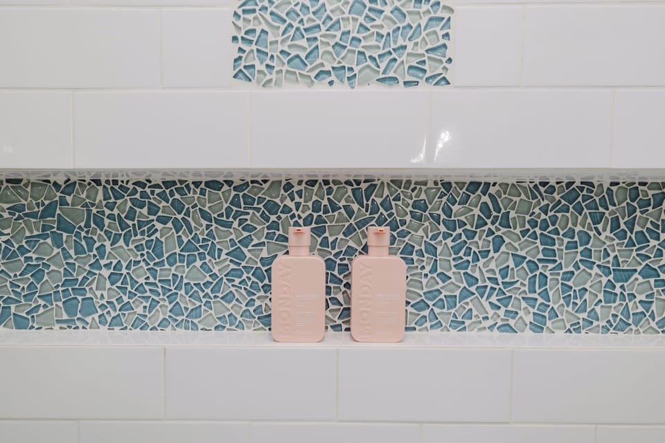 Two full bathrooms stocked with essential toiletries provide comfort and convenience throughout your stay.