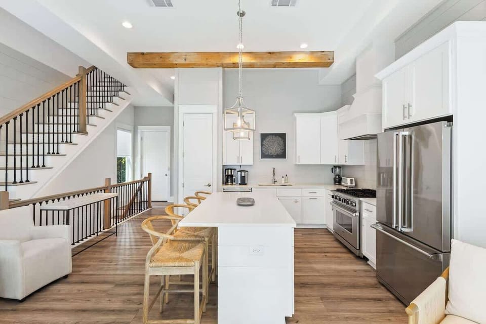 Large kitchen island includes seating for 4.