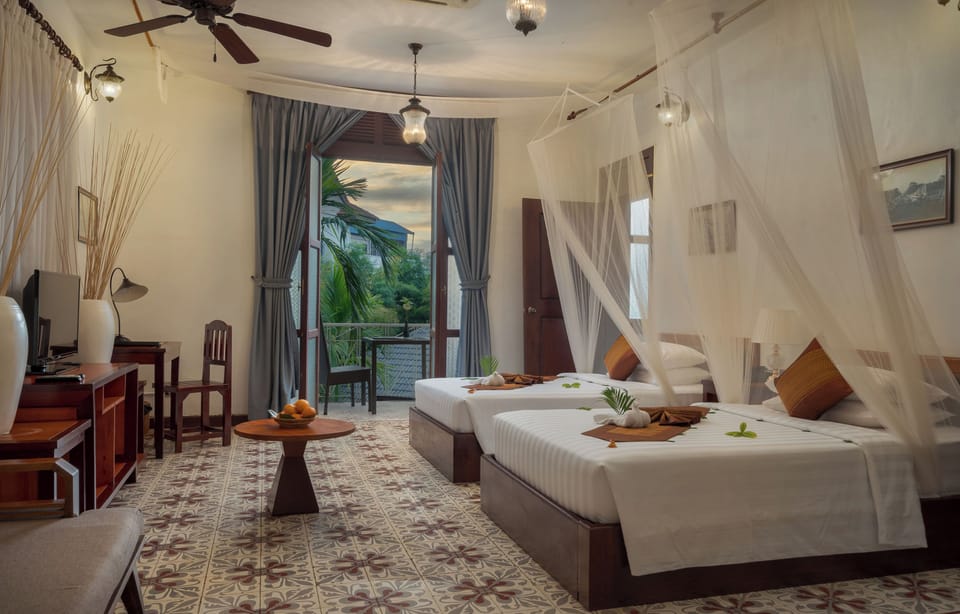 Governor Suite Room | Premium bedding, minibar, in-room safe, desk