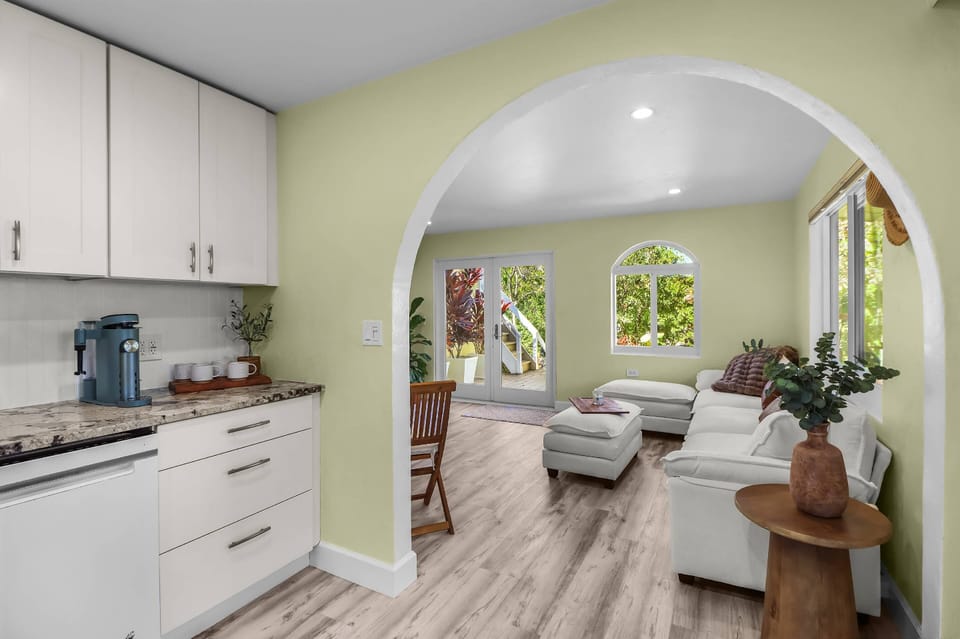 The open floor plan seamlessly connects the kitchen to the living room, making it easy to cook, dine, & chat without missing a moment of conversation.