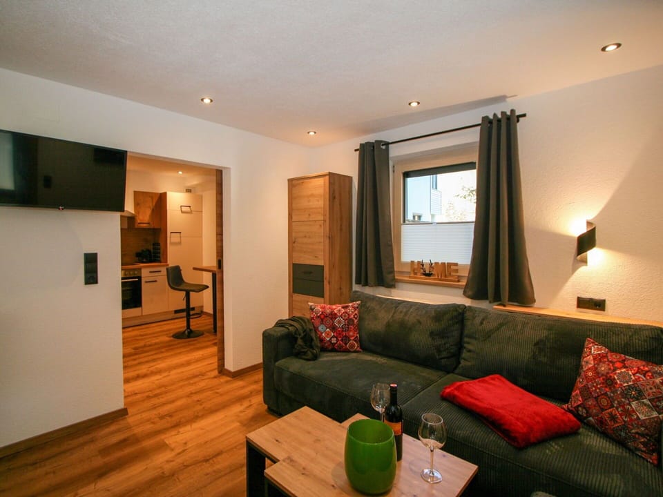 Couch, Furniture, Table, Comfort, Building, Wood, Living Room, Interior Design, Lamp, Flooring
