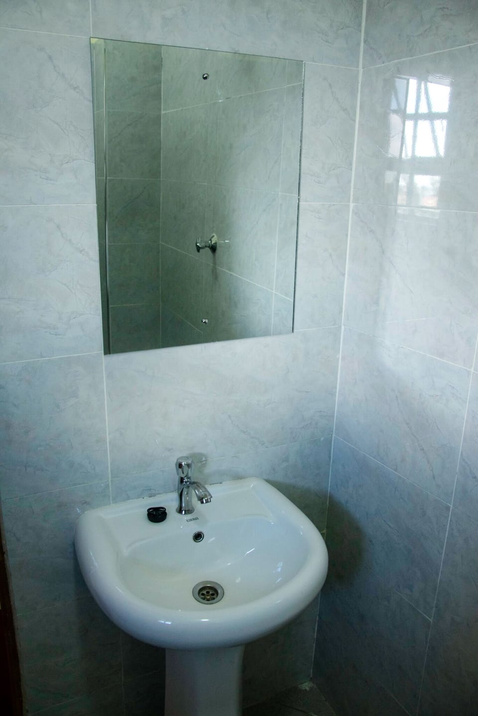 Shower, towels, soap, shampoo