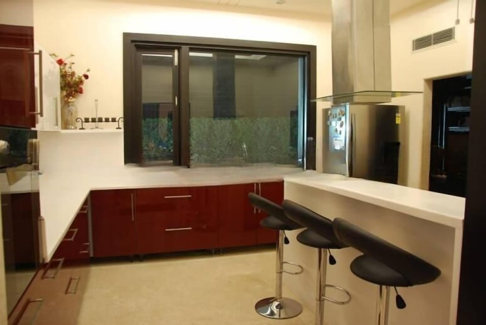 Deluxe Bungalow, Garden View | Private kitchen | Fridge, dishwasher, cookware/dishes/utensils, cleaning supplies