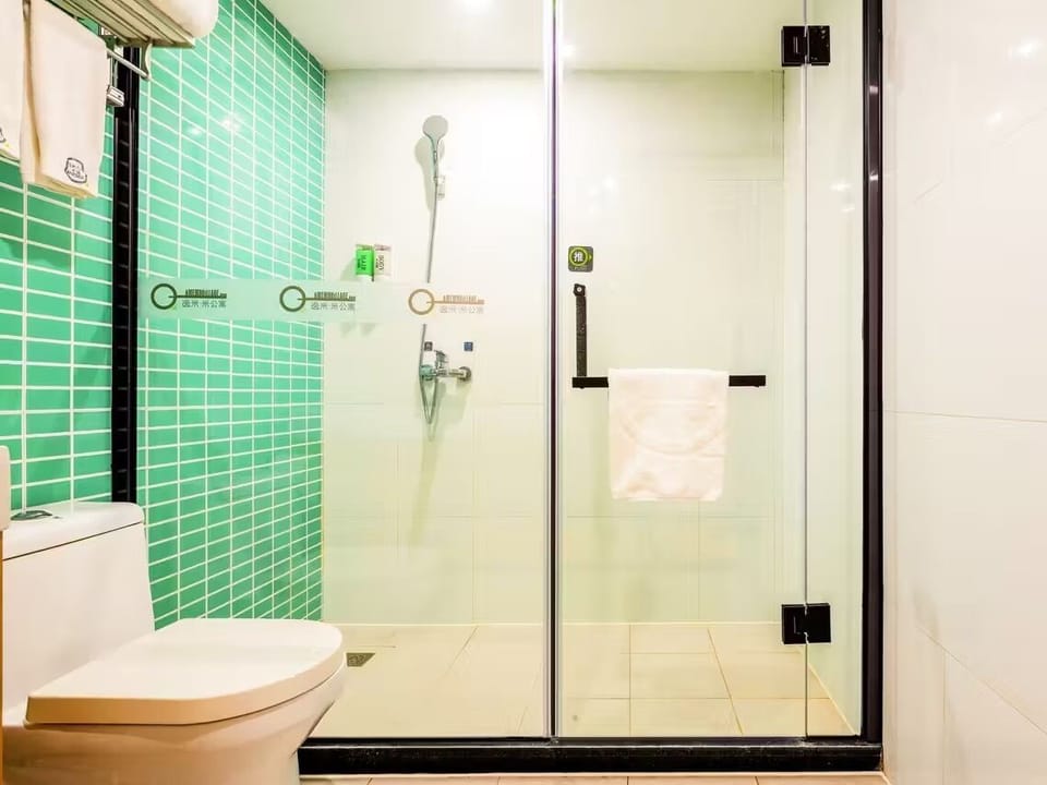 Shower, free toiletries, hair dryer, slippers