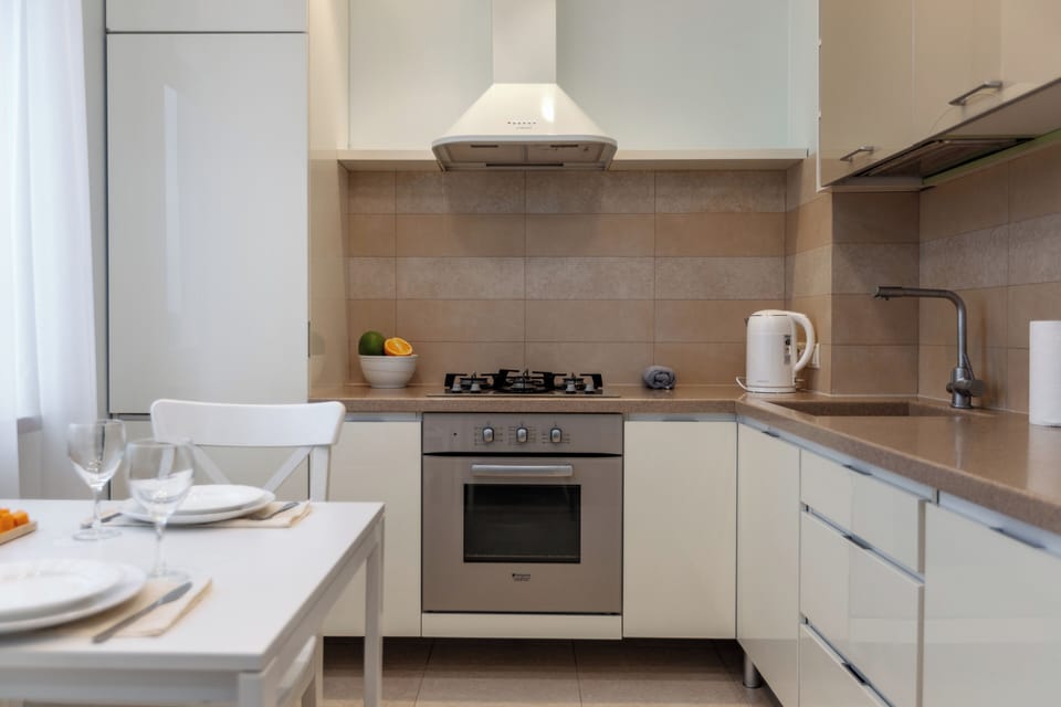 Comfort Suite, River View | Private kitchen | Full-size fridge, oven, stovetop, electric kettle