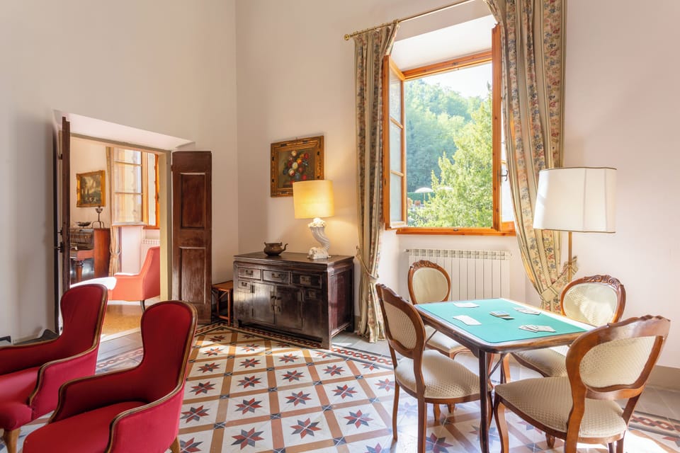 Villa, Hill View | Living area | 32-inch flat-screen TV with cable channels, fireplace, foosball