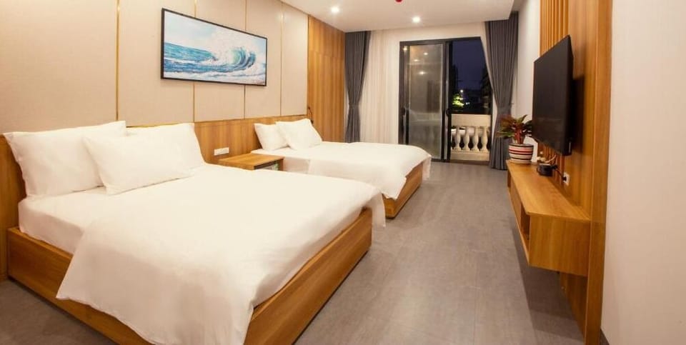 Deluxe Quadruple Room, Balcony, City View | In-room safe, desk, iron/ironing board, free WiFi