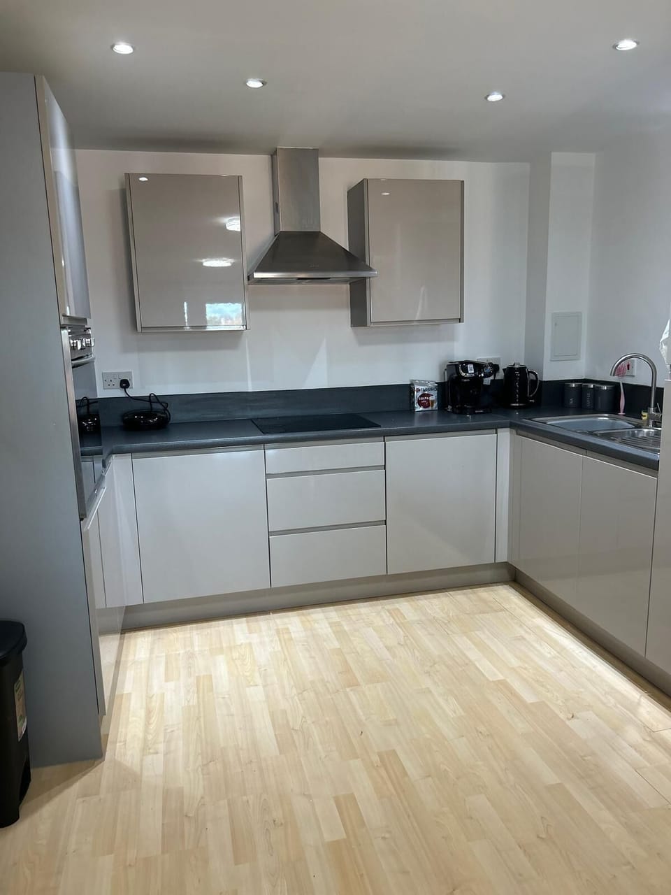 Fully equipped kitchen with modern appliances, offering a spacious and functional area for preparing meals with ease.