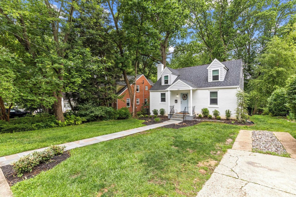 Beautiful curb appeal surrounded by lush greenery
